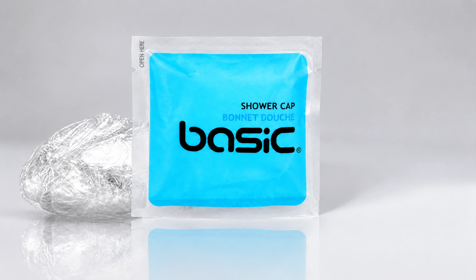 Bonnet de douche Basic : 0,08 € au lieu de 0,09 € par bonnet.